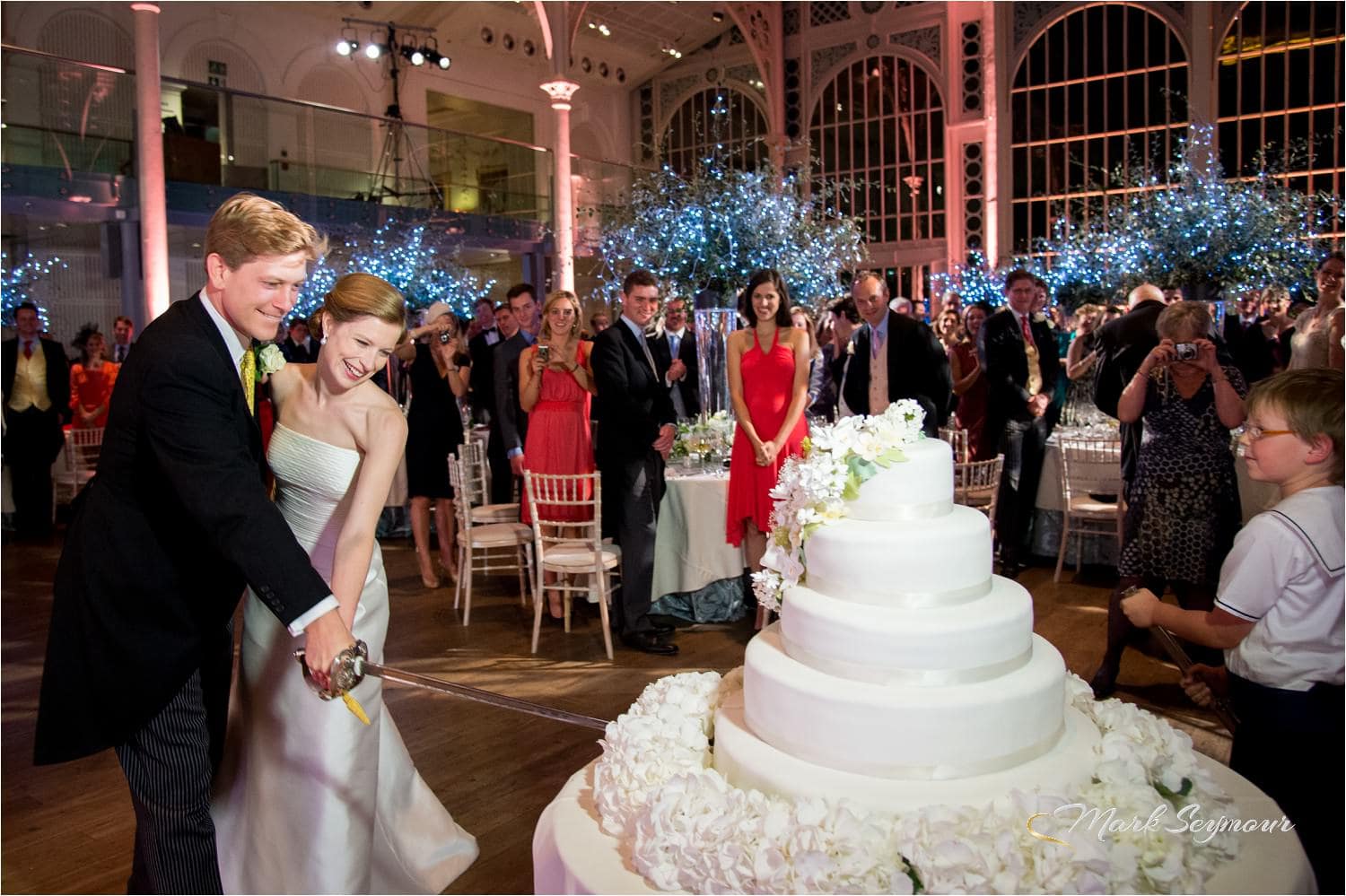 Cake cutting with a sword